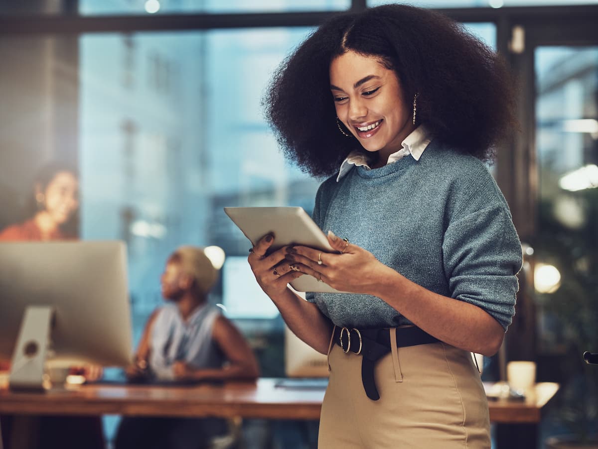 Young Woman at Work Using Tablet