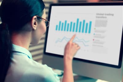 Woman Looking at Goals in Google Analytics